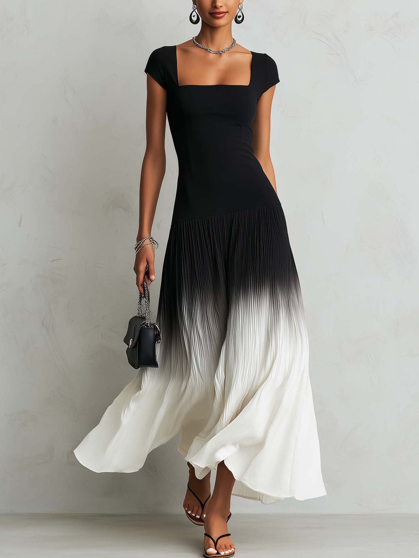 Black square-neck maxi dress with a gradient hem
