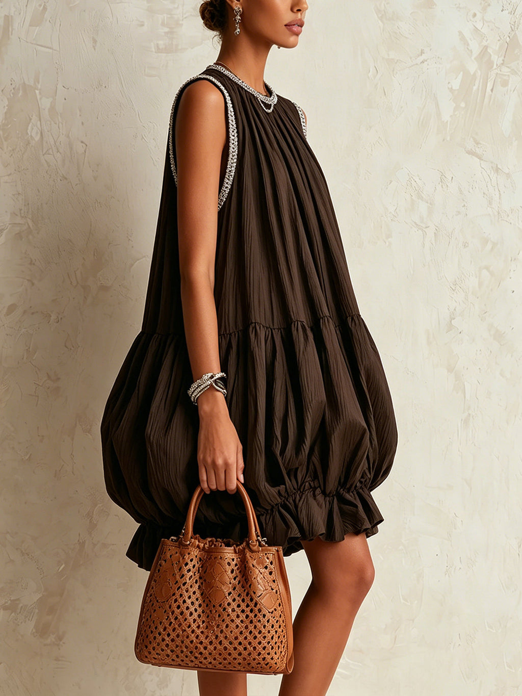 Brown sleeveless mini dress with a bubble hem