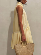 Yellow Sleeveless Mini Dress with Deep V-Neck and Lace Trim