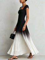 Black square-neck maxi dress with a gradient hem