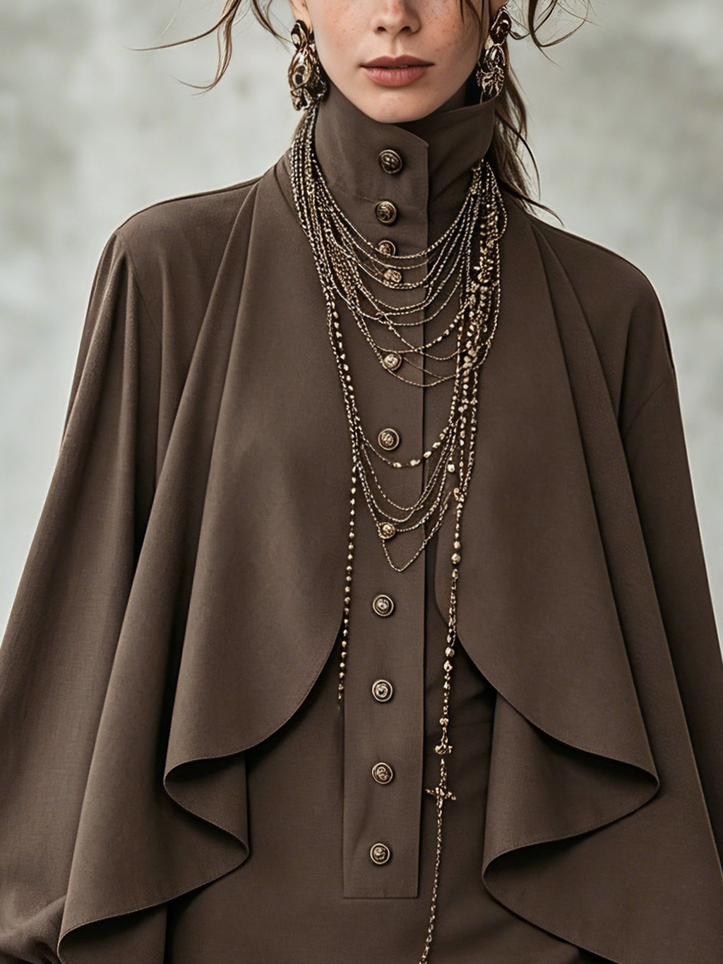 Chocolate high-neck mini dress with cape-style paneling