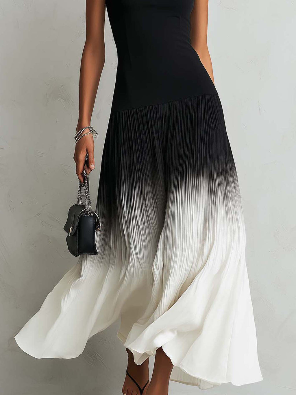 Black square-neck maxi dress with a gradient hem
