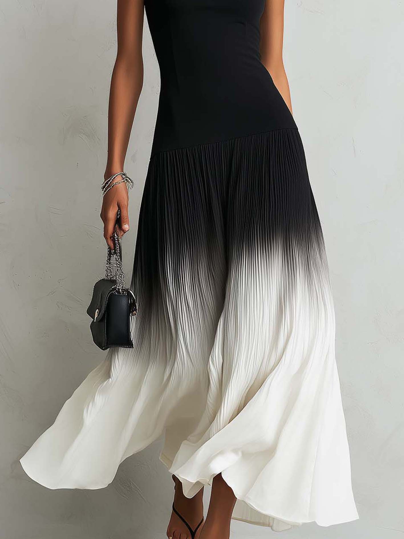 Black square-neck maxi dress with a gradient hem
