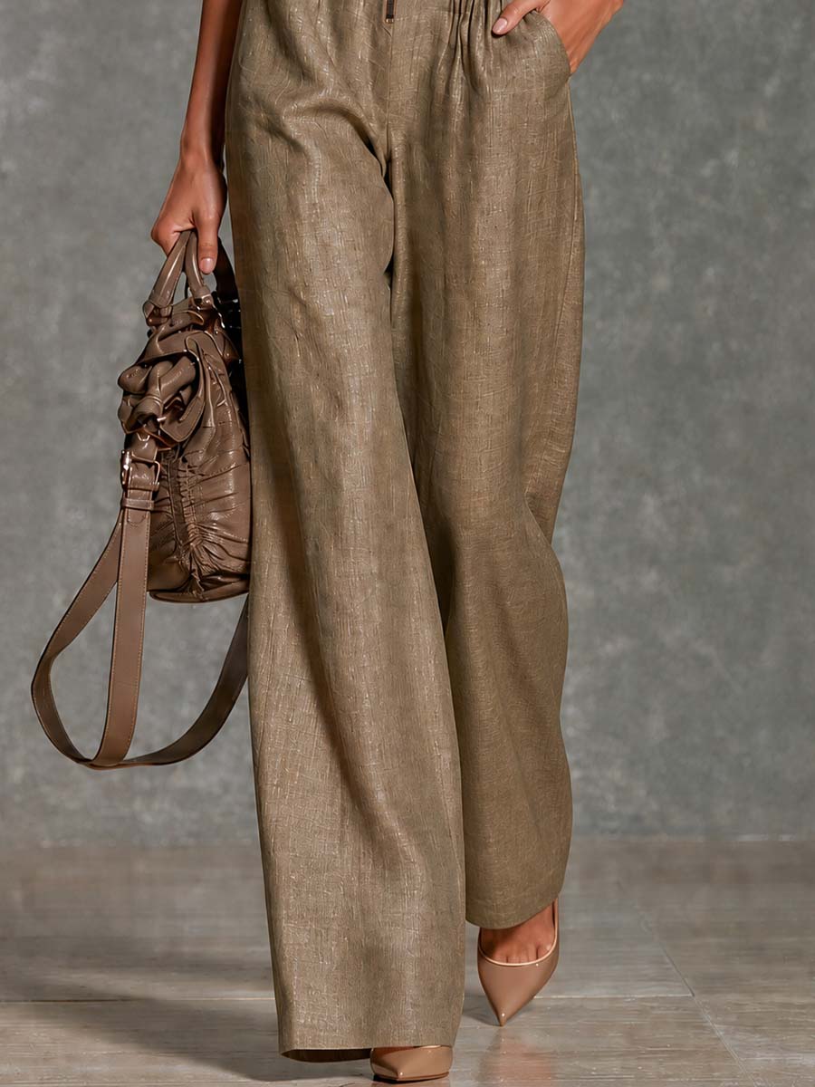 Vintage tie-neck sleeveless wide-leg jumpsuit with lace trim