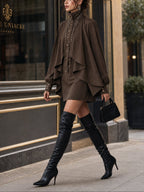 Chocolate high-neck mini dress with cape-style paneling