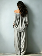 Loose Two-Piece Set Featuring An Off-Shoulder Grey Cotton Top With Three-Quarter Sleeves And Matching Trousers