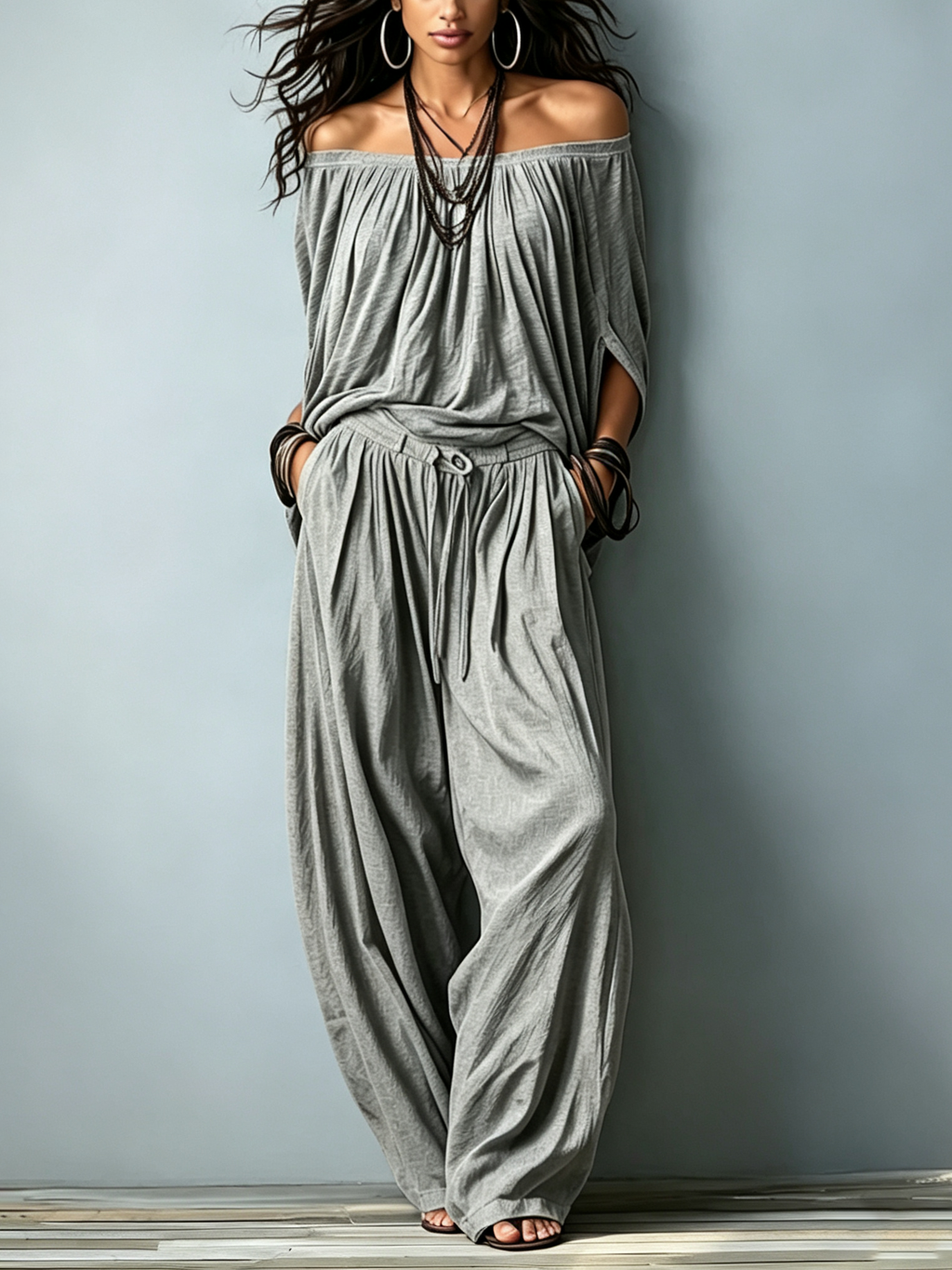Loose Two-Piece Set Featuring An Off-Shoulder Grey Cotton Top With Three-Quarter Sleeves And Matching Trousers