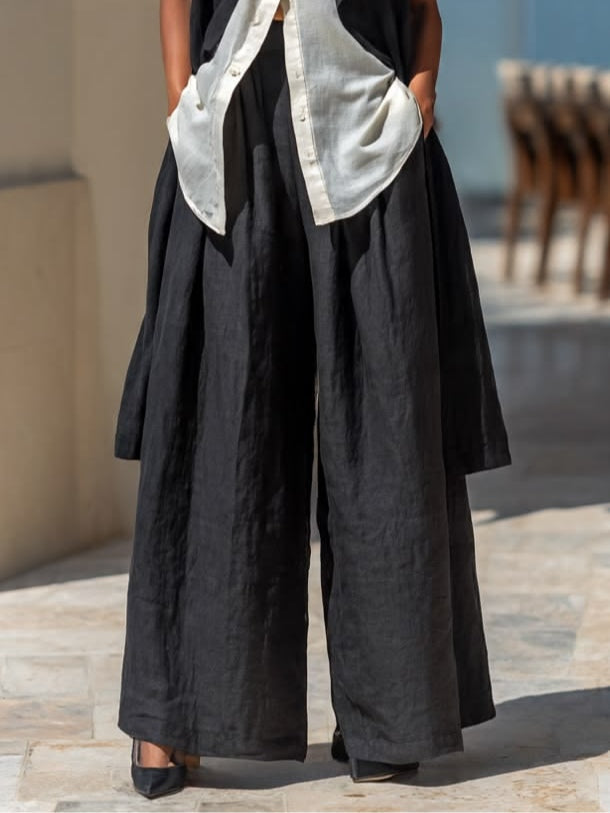 Black and white sleeveless vest and wide-leg trousers linen three-piece set