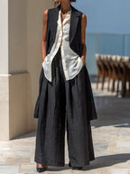 Black and white sleeveless vest and wide-leg trousers linen three-piece set