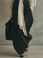 Beige lace-up shirt and black trousers set