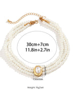 Short faux pearl and turquoise bead necklace