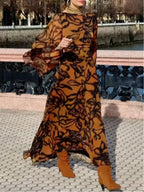 Brown long printed dress with wide sleeves