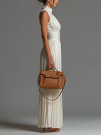 White V-neck Sleeveless Zip-up Pleated Wide-leg Chiffon Jumpsuit