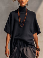 Black Knit Top And Grey Pleated Skirt Suit