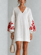 White Long-sleeve Mini Dress With Striking Red Floral Print And Lantern Sleeves
