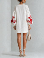White Long-sleeve Mini Dress With Striking Red Floral Print And Lantern Sleeves